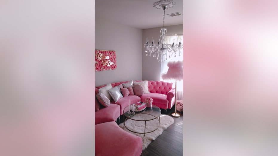 pink couch in living room