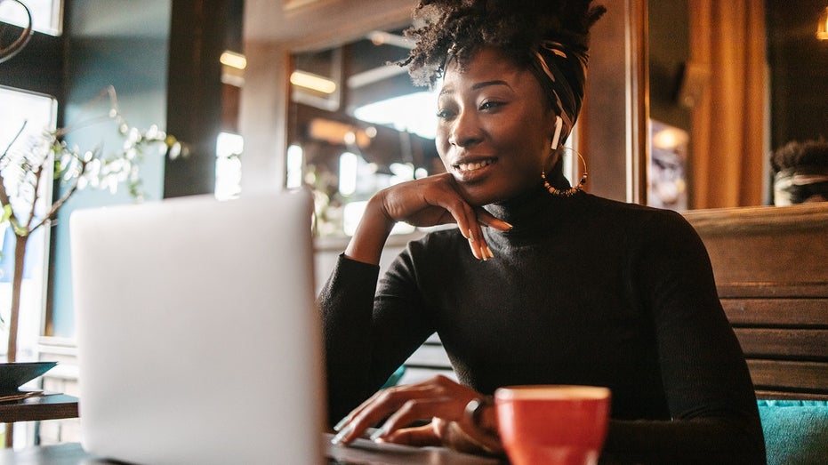 young woman working at a cafe