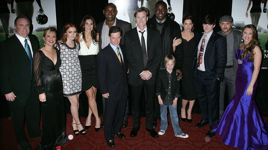 The cast of "The Blind Side" with Sean and Leigh-Anne, SJ and Collins and producers on the film