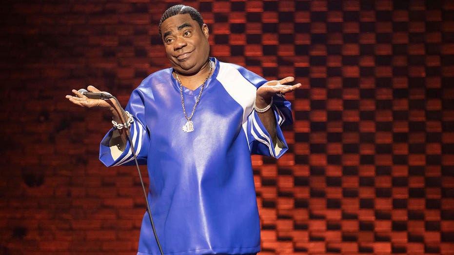 tracy morgan raising hands during stand-up special