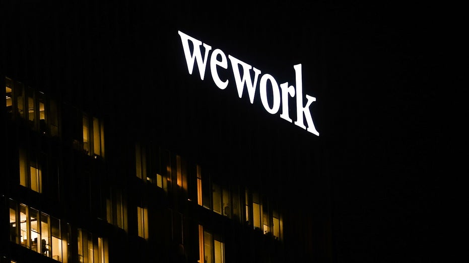 wework logo on dark office building