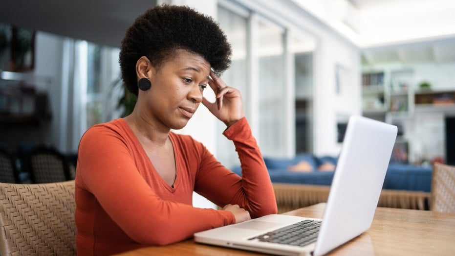 woman on Zoom call looking unimpressed