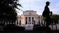 A pedestrian passes the Marriner S. Eccles Federal Reserve building in Washington, DC, US, on Saturday, June 3, 2023. Signs of labor-market slackening in May despite a pickup in hiring are likely to keep the Federal Reserve on hold this month while policymakers mull a hike later in the summer. Photographer: Nathan Howard/Bloomberg via Getty Images - Fox News
