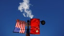 The flags of the United States and China fly from a lamppost in the Chinatown neighborhood of Boston, Massachusetts, on Nov. 1, 2021. - Fox Business News