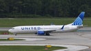 A United Airlines plane is seen taxiing on the tarmac at Orlando International Airport in Orlando.  - Fox Business News
