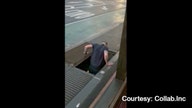 Man jumps below sidewalk grate twice for AirPods, keys in viral video