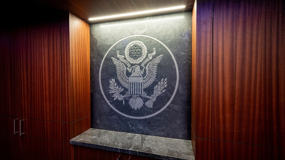 Presidential seal on the wall