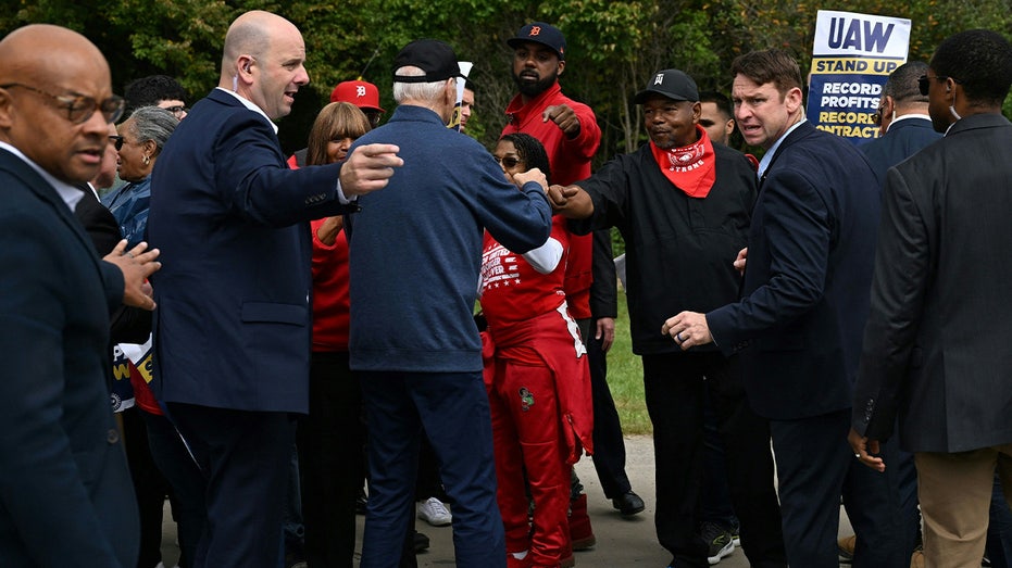 Joe Biden with UAW strikers