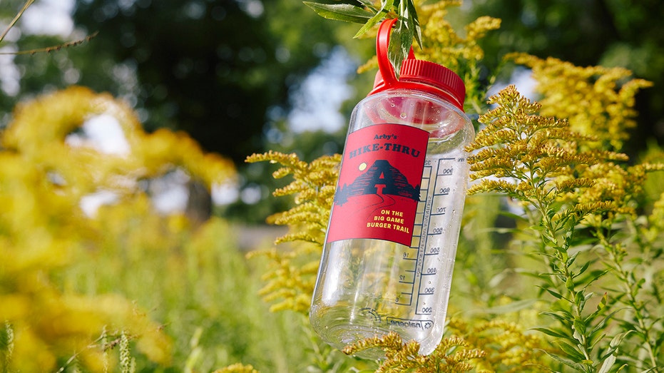 water bottle with arby's hike sticker