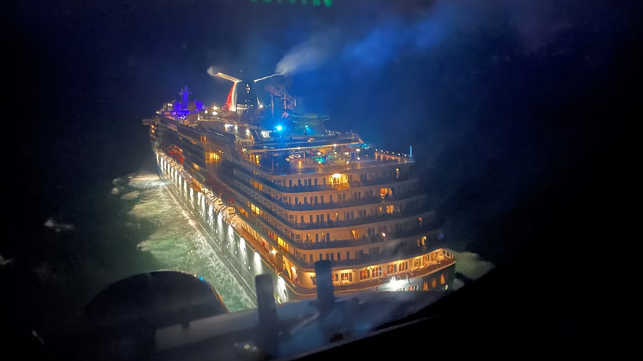 Carnival Legend cruise ship at night in Atlantic Ocean