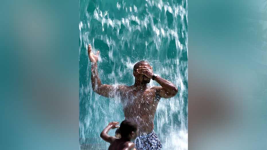 Man and son at waterpark