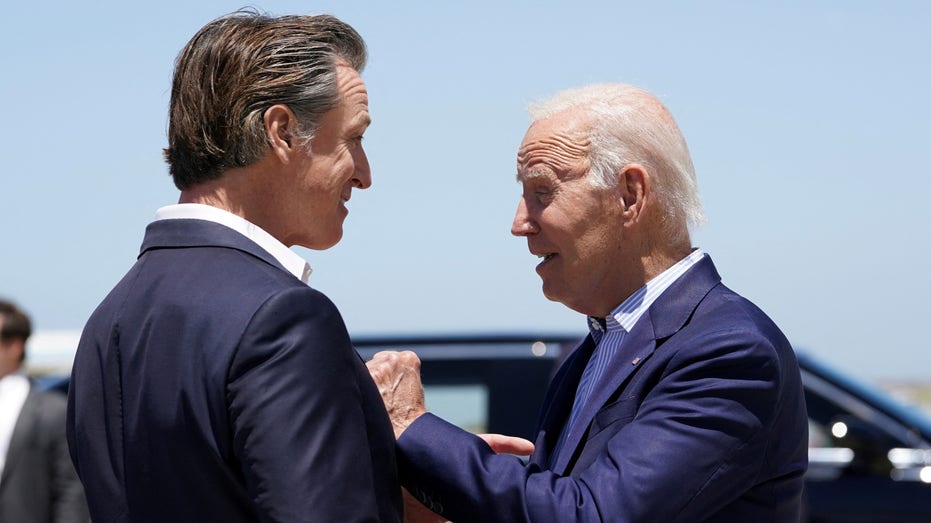 California Gov. Gavin Newsom greets President Biden