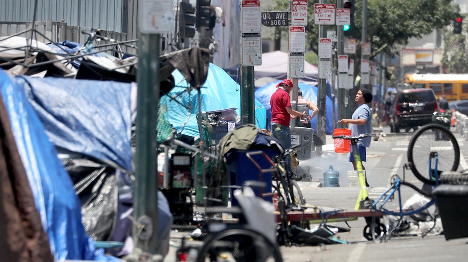 Homelessness tents line LA sidewalk