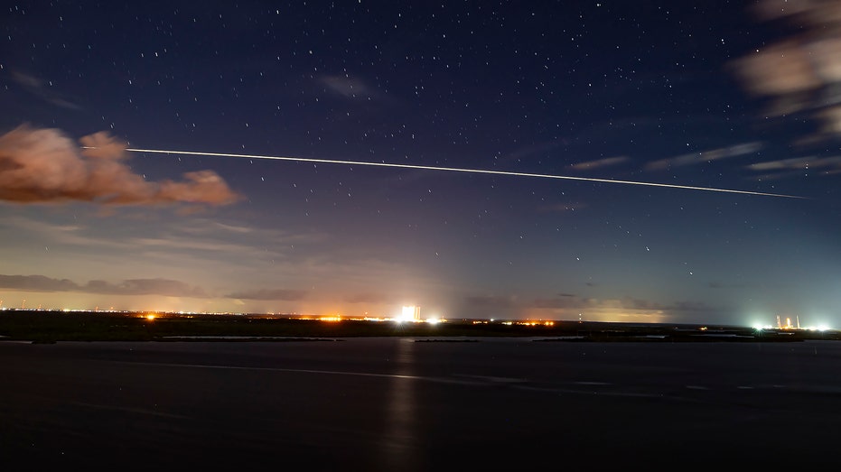 SpaceX capsule streak across sky