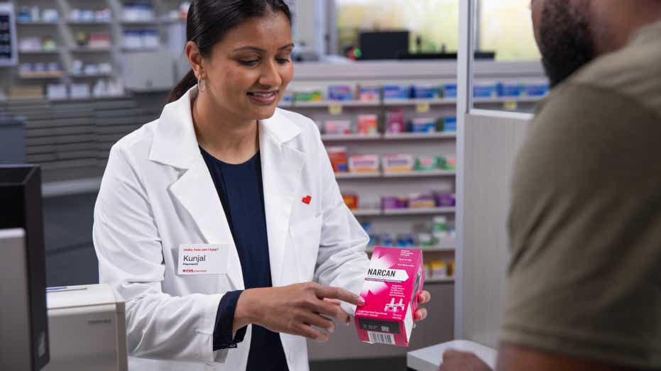 Pharmacist selling Narcan