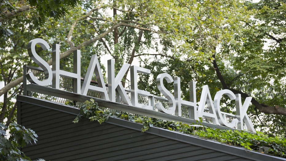 Shake Shack sign on restaurant roof.