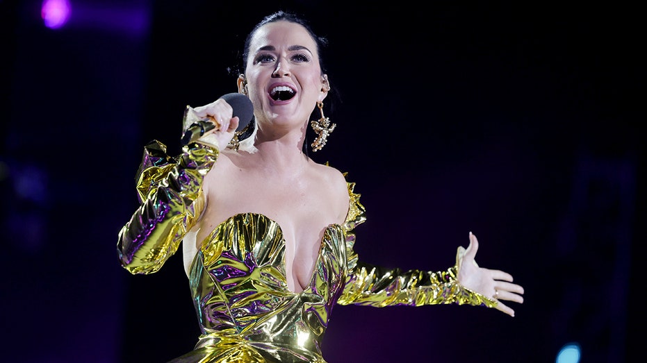 Katy Perry in a gold metallic spiky dress performing at the King's Coronation