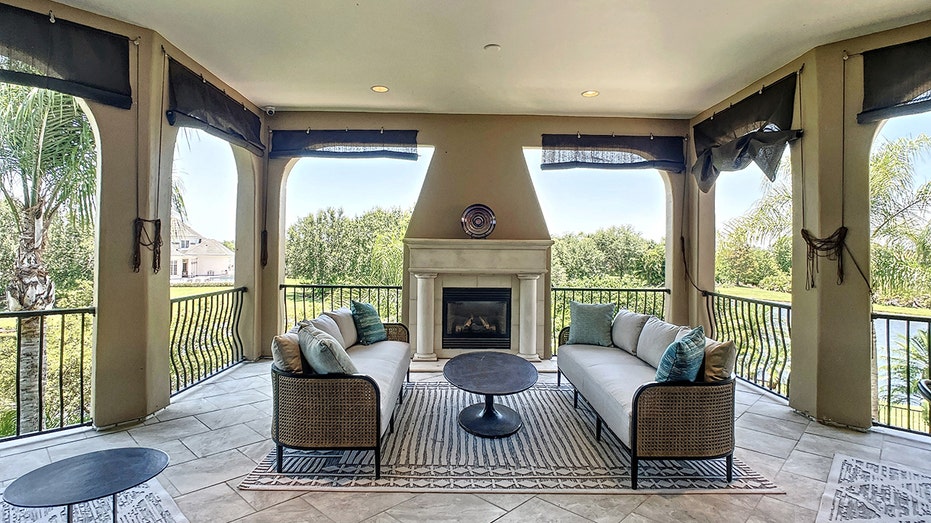 master bedroom balcony with fireplace