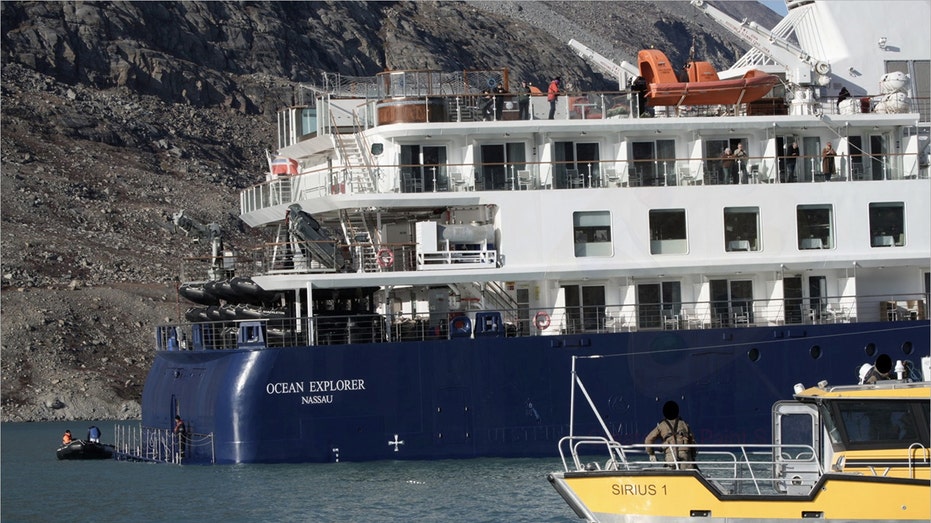 SIRIUS personnel approach the Ocean Explorer in small boats