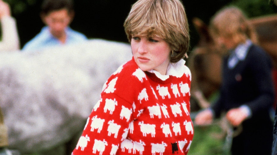 Princess Diana wearing her black sheep sweater