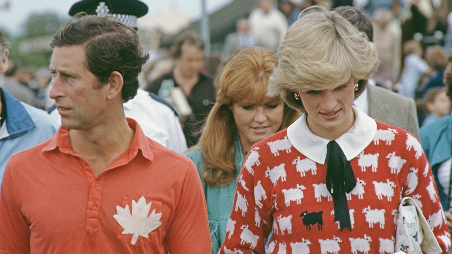 Princess Diana with Prince Charles in her black sheep sweater