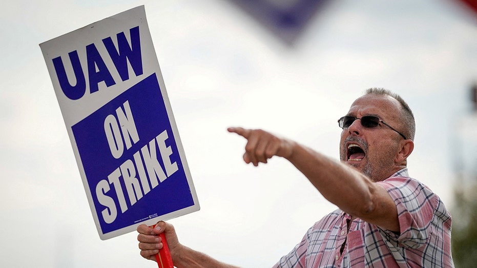 A United Auto Workers member on strike