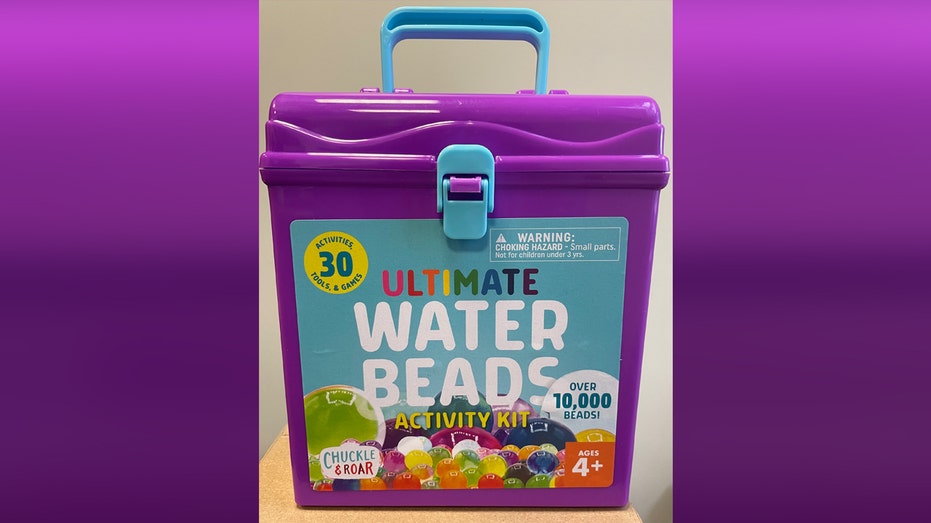 A purple tub of Chuckle & Roar water beads