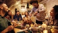 Group of friends gathering at dining table for Thanksgiving dinner. Focus is on man carving roast turkey. - Fox News