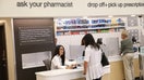WHEELING, IL - SEPTEMBER 19:  Pharmacist Jeanie Kim (L) consults with a customer at a Walgreens pharmacy on September 19, 2013 in Wheeling, Illinois. Walgreens, the nation's largest drugstore chain, yesterday disclosed a plan to provide payments to roughly 160,000 eligible employees for the subsidized purchase of insurance beginning next year. The company says the plan will allow their employees to shop for coverage that best suits their needs through a private health-insurance marketplace.  (Photo by Scott Olson/Getty Images) - Fox Business News