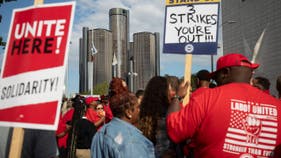 Major automaker sees big layoffs as UAW strike rages on