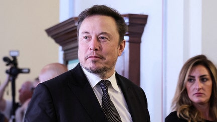 FILE PHOTO: Elon Musk arrives for a bipartisan Artificial Intelligence (AI) Insight Forum for all U.S. senators hosted by Senate Majority Leader Chuck Schumer (D-NY) at the U.S. Capitol in Washington, U.S., September 13, 2023. REUTERS/Leah Millis/File Photo
