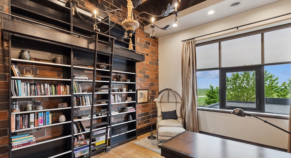 bookcase and brick school walls