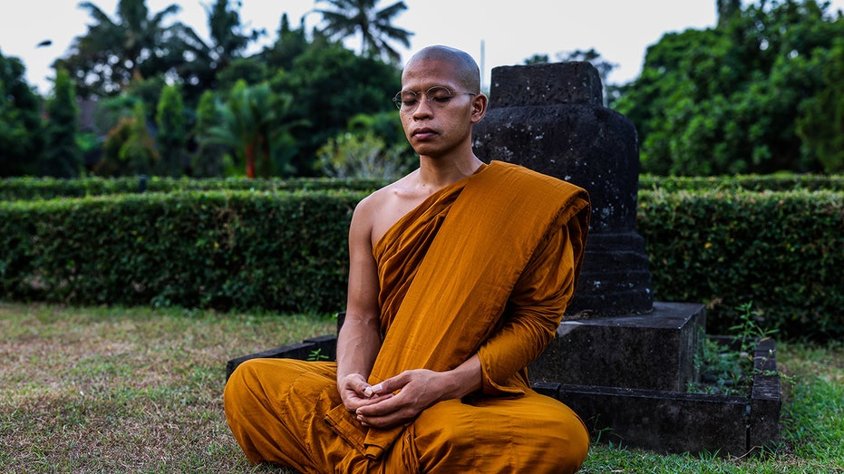 Buddhist monk outside