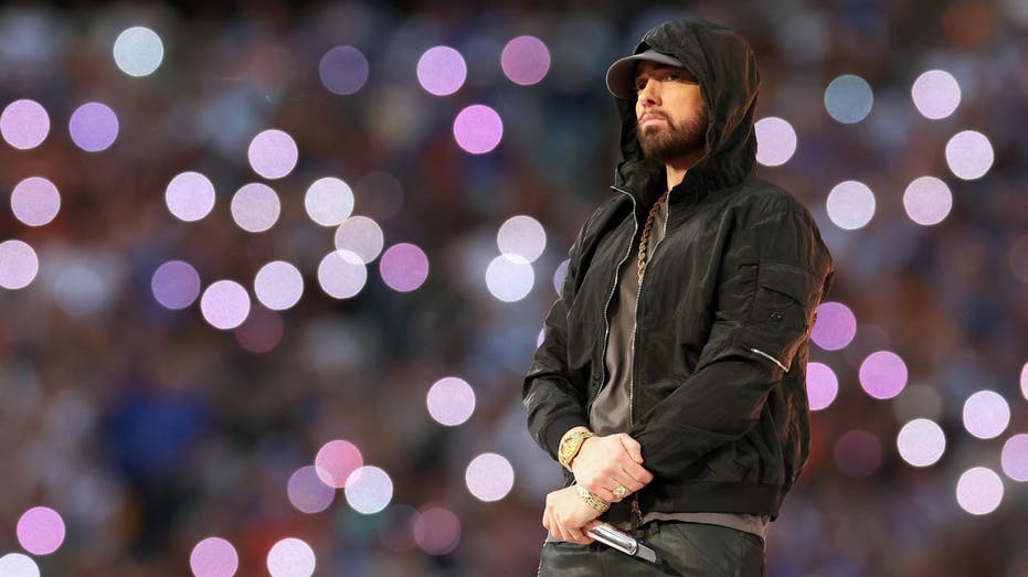 Eminem standing on stage