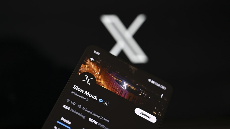 X logo, a cell phone