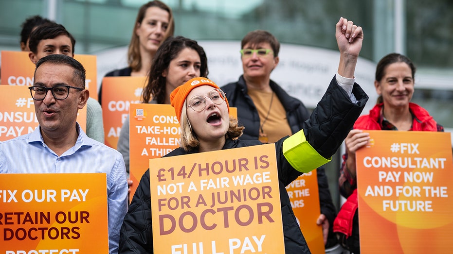 Workers on strike, cheering