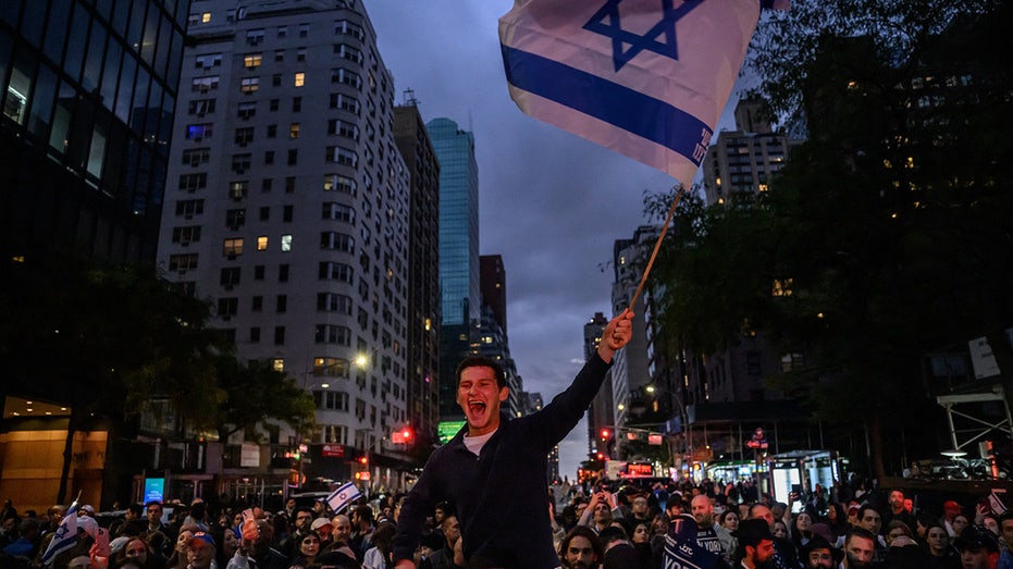 pro-Israel protesters wave flags in NYC