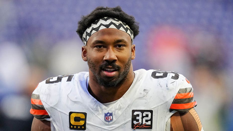 Myles Garrett exits the football field after an NFL game