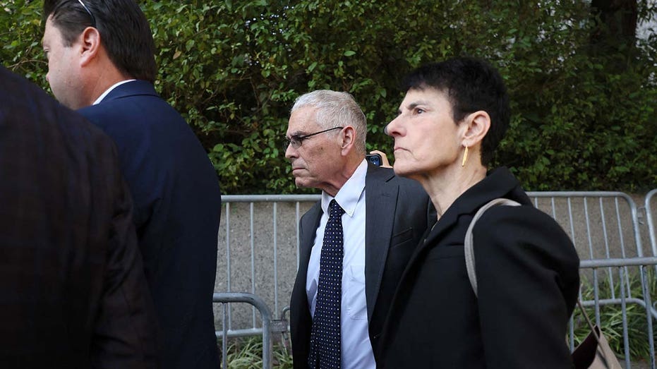Joseph Bankman and Barbara Fried arrive at a Manhattan courthouse