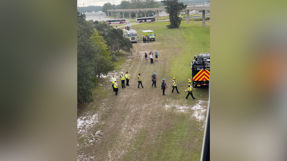 First responders at Disney World seen on the ground before evacuating the train