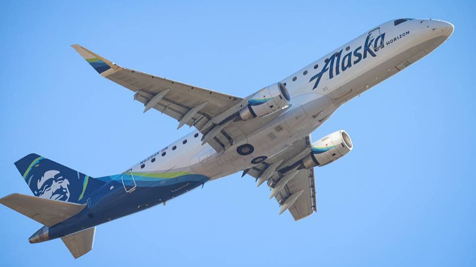 Alaska Airlines plane in flight