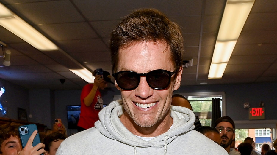 Tom Brady smiles