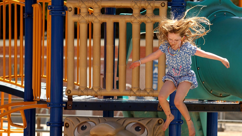 A child plays at a recreation center in Los Angeles