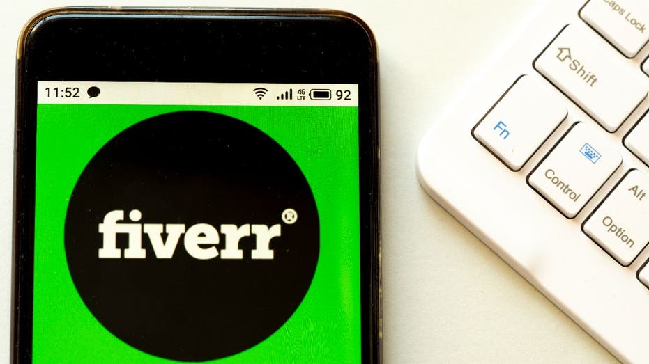 fiverr logo on smartphone