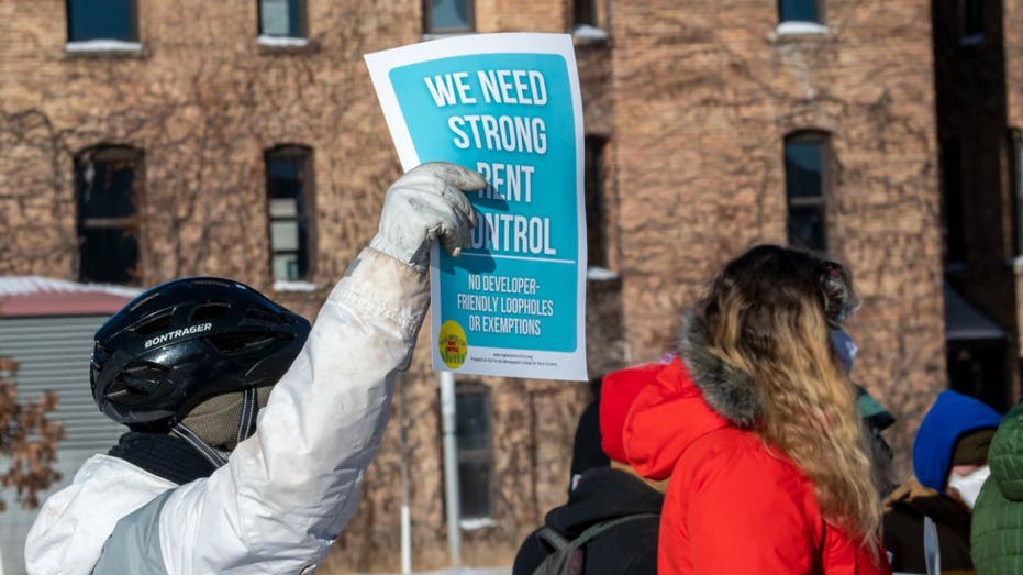 protesters march for rent control in Minneapolis