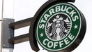 FILE PHOTO: FILE PHOTO: The Starbucks sign is seen outside one of its stores in New York July 3, 2008. REUTERS/Chip East (UNITED STATES)/File Photo/File Photo
