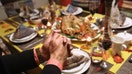 STAMFORD, CT - NOVEMBER 24: Central American immigrants and their families pray before Thanksgiving dinner on November 24, 2016 in Stamford, Connecticut. Family and friends, some of them U.S. citizens, others on work visas and some undocumented immigrants came together in an apartment to celebrate the American holiday with turkey and Latin American dishes. They expressed concern with the results of the U.S. Presidential election of president-elect Donald Trump, some saying their U.S.-born children fear the possibilty their parents will be deported after Trump&apos;s inauguration. (Photo by John Moore/Getty Images)
