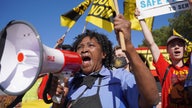 Waffle House workers rally at corporate office, demanding better wages, working conditions