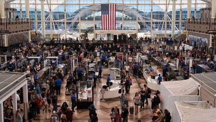 Travelers are seen lining up at a Transportation Security Administration security checkpoint at Denver International Airport in Colorado on  Saturday, Aug. 19, 2023.   - Fox Business News