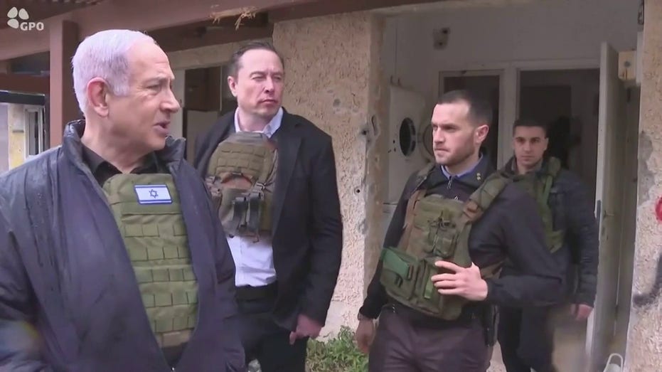 Netanyahu, Musk wearing protective equipment